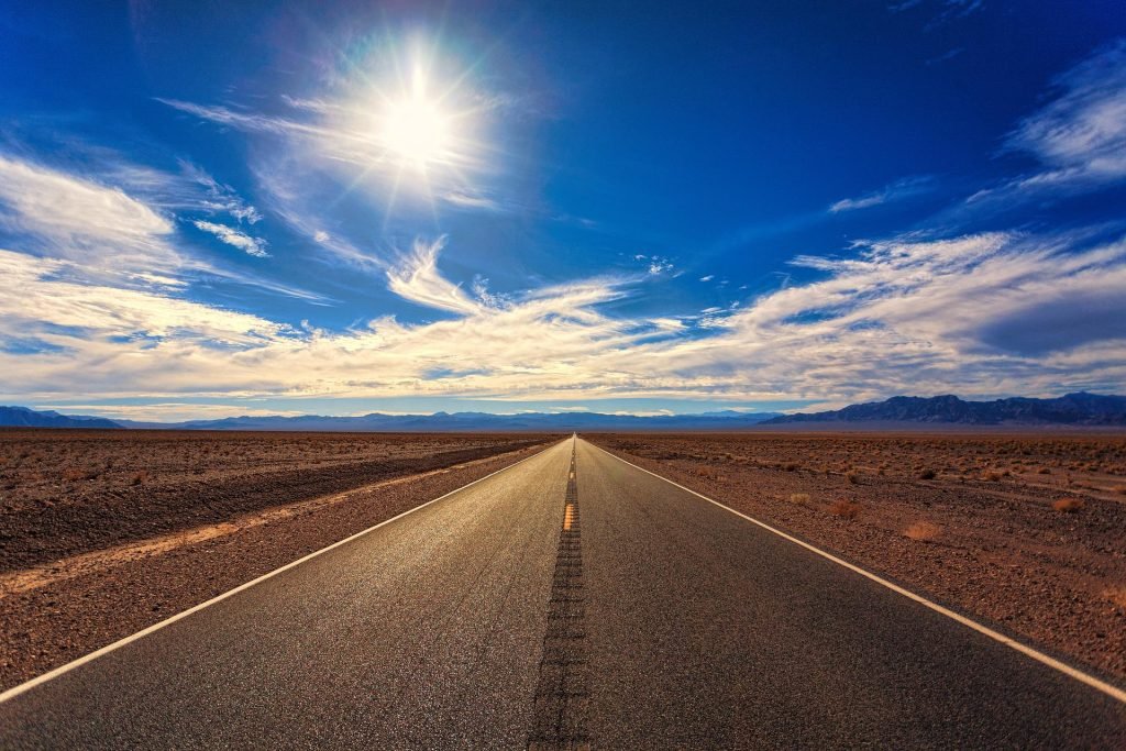 vast road going to the end of the skyline